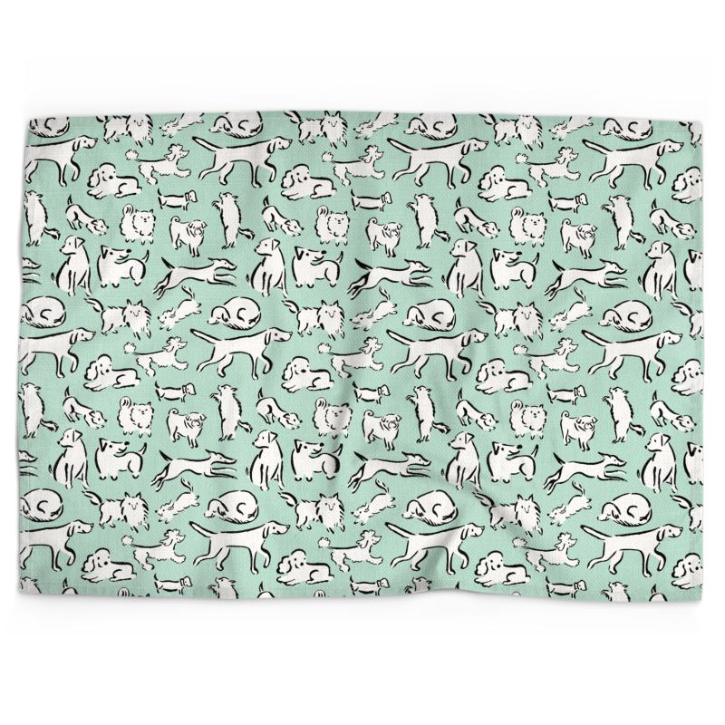 Dogs of all kinds on minty green background