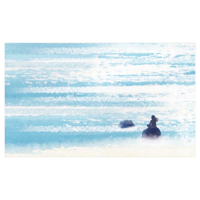 Fine art print of woman sitting on rock, sparkling ocean